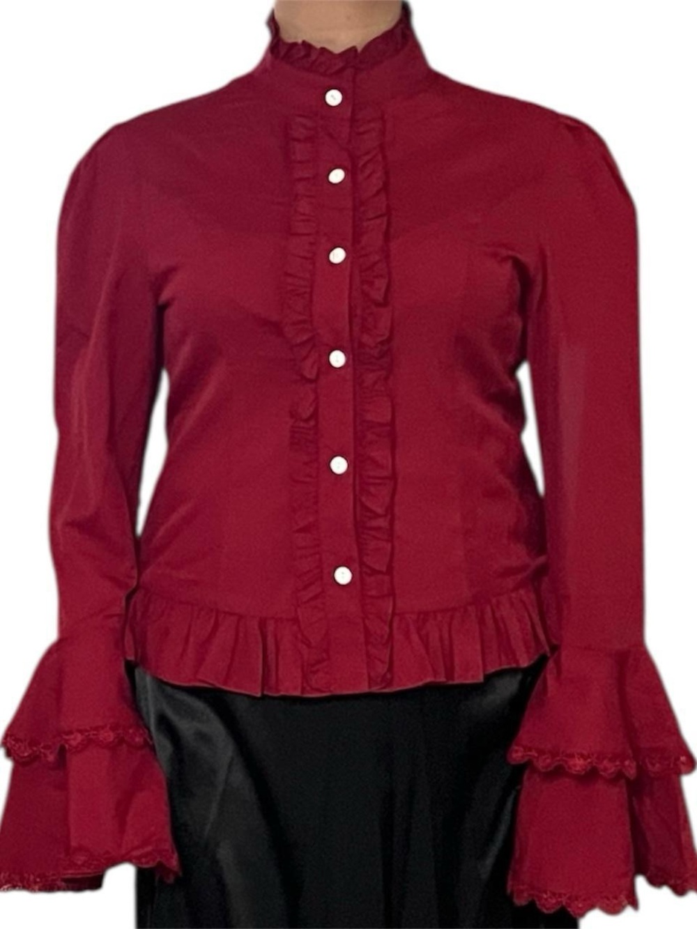 Maroon ruffle button up top with ruffled collar and bell sleeves.